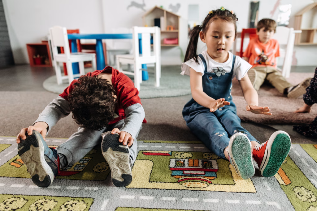 Stock Image of three child stretching on playmat in a classroom (pexels)
Movement and ADHD: The Proven Way to Boost Your Child's Learning -